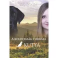 A képen A boldogság forrása a kutya című könyv látható egy labradorral a háttérben.