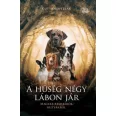 A képen A hűség négy lábon jár című könyv látható a háttérben mancsnyomokkal.
