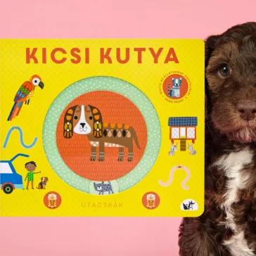 A képen a Kicsi kutya című könyv látható a háttérben egy kölyökkel.