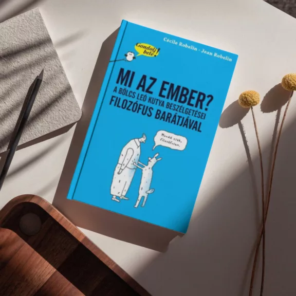 A képen a Gondolj bele Mi az ember című könyv látható a háttérben egy női és egy férfi alak.