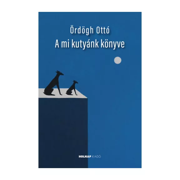 A képen A mi kutyánk könyve című könyv látható a háttérben két agárral.