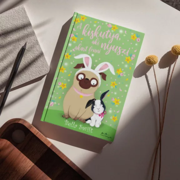 A képen az A kiskutya aki nyuszi akart lenni című könyv látható a háttérben nyuszinak öltözött kutyákkal.