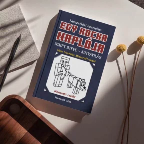 A képen az Egy kocka naplója 3 című könyv látható Minecraft háttér előtt.