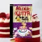 A képen a Pálcikakutya és a torta című könyv látható a háttérben tortával.