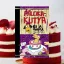 A képen a Pálcikakutya és a torta című könyv látható a háttérben tortával.