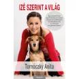 A képen az Izé szerint a világ című könyv látható egy kutyával a háttérben.
