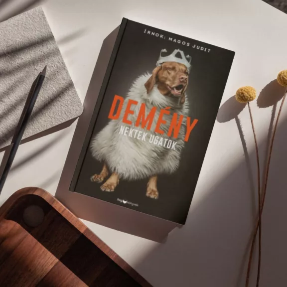A képen a Demény - Nektek ugatok című könyv látható egy kutyával a háttérben.