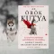 A képen Az örök kutya című könyv látható a háttérben egy huskyval.
