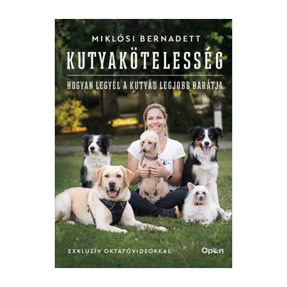 A képen a Kutyakötelesség című könyv látható a háttérben kutyákkal.