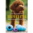 A képen a Kölyökkutya című könyv látható kölyök uszkárokkal a háttérben.