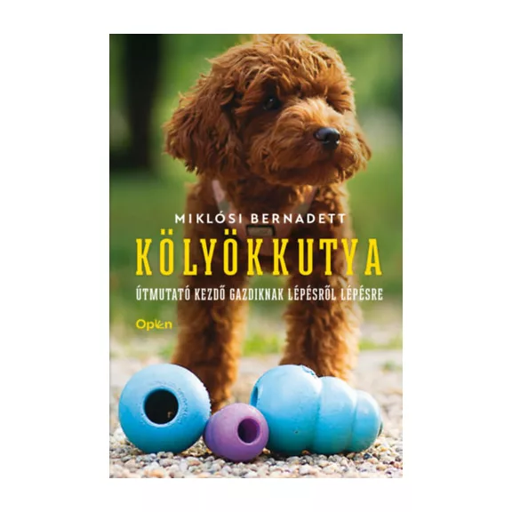 A képen a Kölyökkutya című könyv látható kölyök uszkárokkal a háttérben.