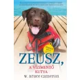 A képen Zeusz A vízimentő kutya című könyv látható a háttérben két kutyával.